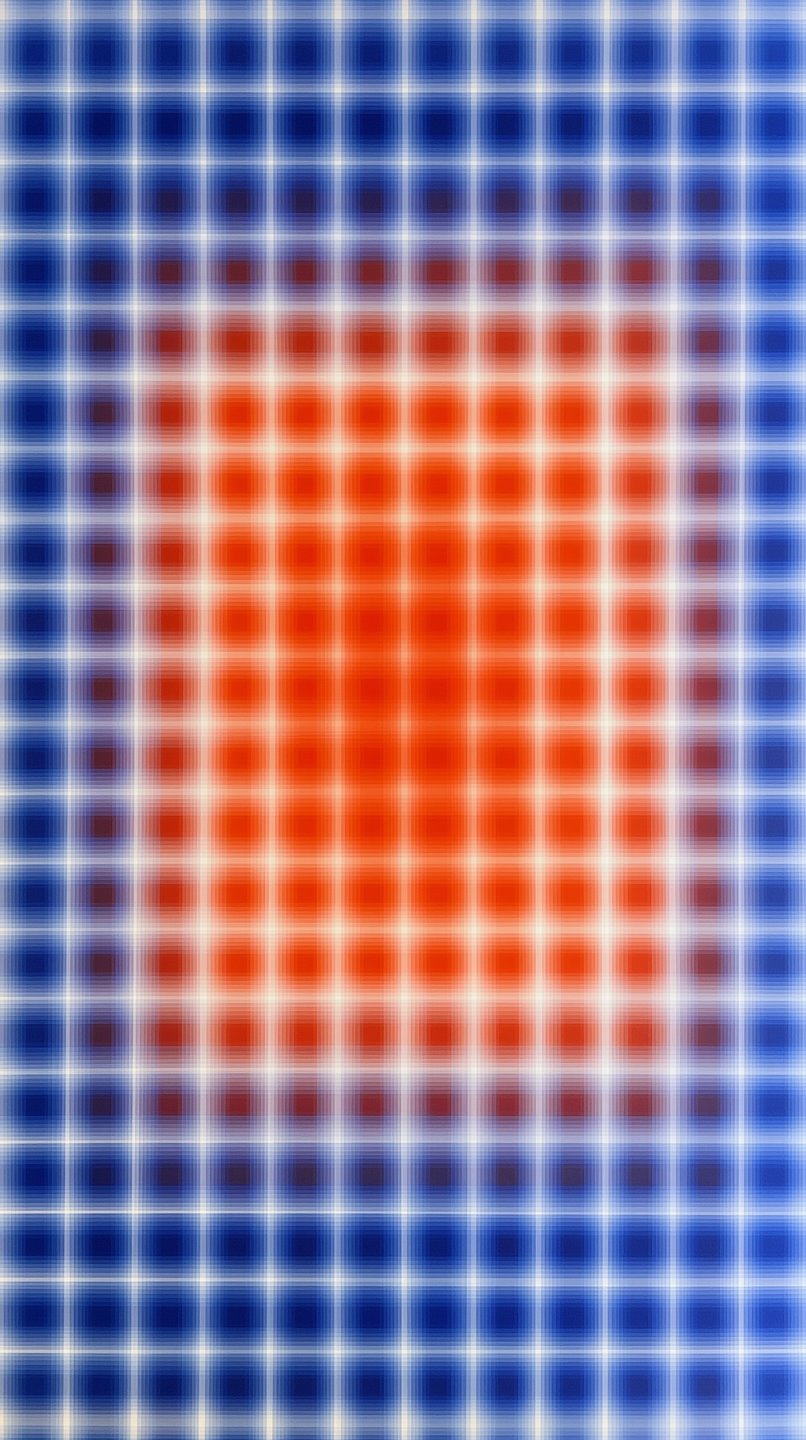 Abstract geometric grid pattern transitioning from a deep blue border to a vibrant orange and red center.