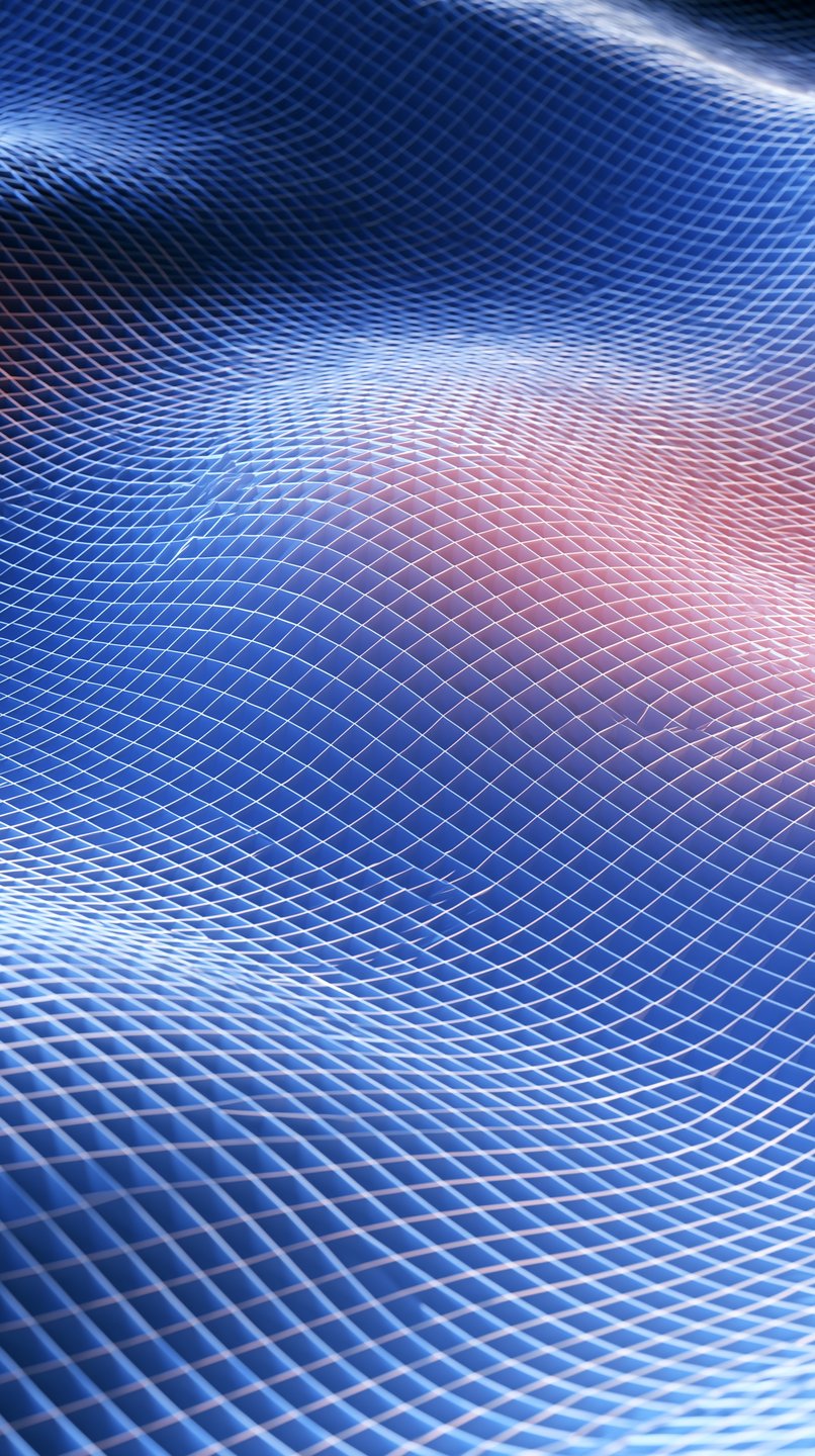 Undulating blue wireframe grid landscape with a soft pink glow and shallow depth of field.
