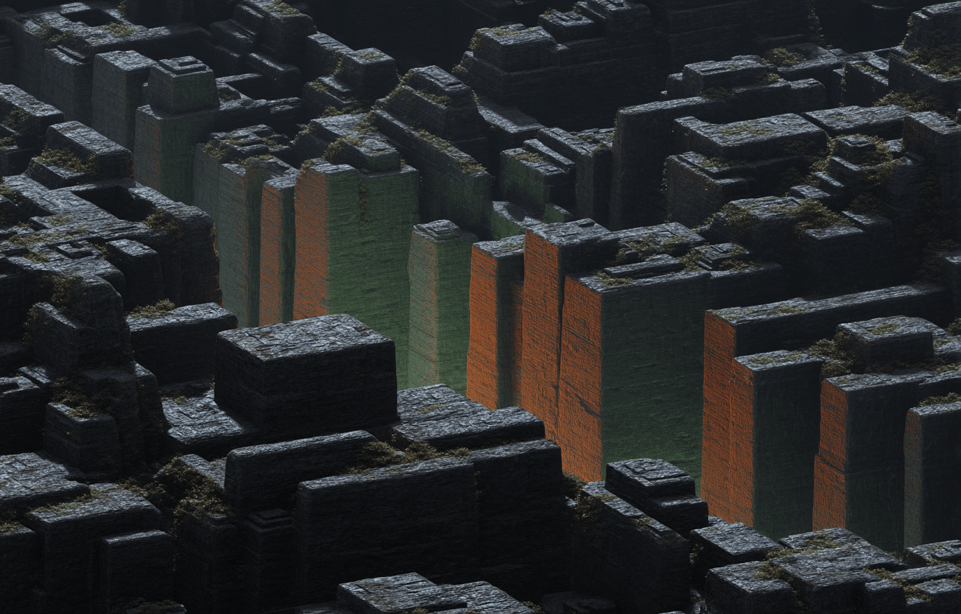 High-angle view of dense monolithic stone blocks with orange-lit vertical faces and green mossy textures.