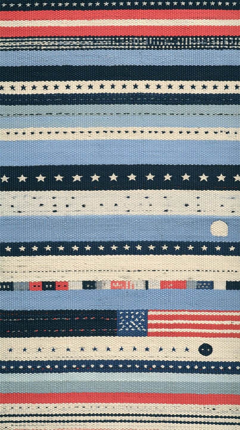 Woven Americana rag rug with red, white, and blue horizontal stripes, star patterns, and miniature flag details.