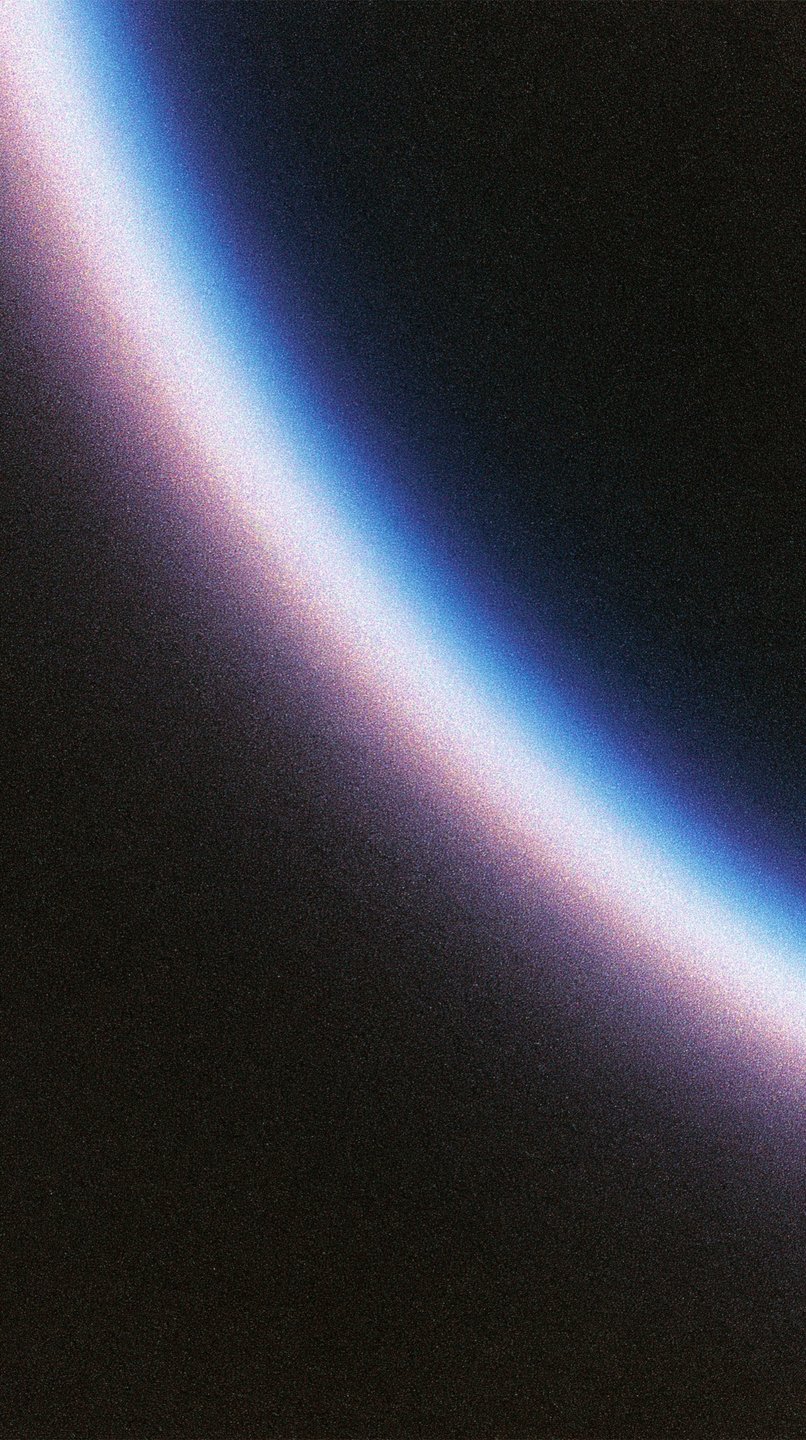 A curved, glowing beam of chromatic light with blue and pink edges cuts diagonally across a dark, grainy background.