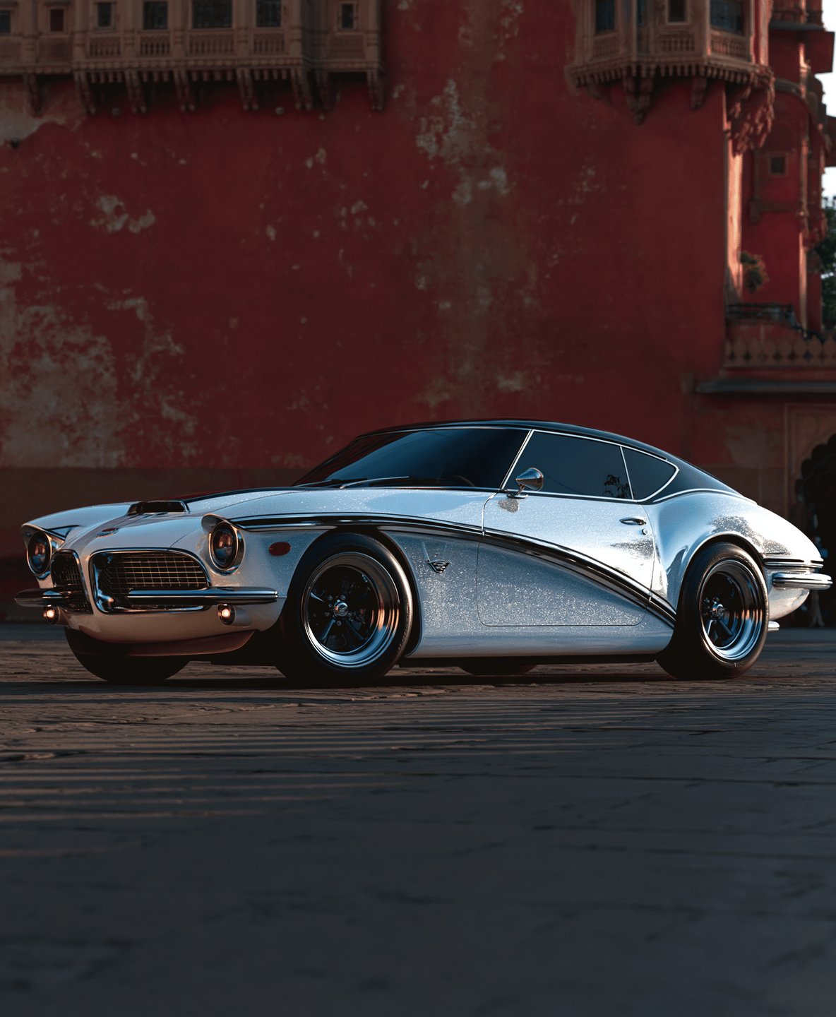 Silver custom coupe with glitter paint parked in front of a weathered red ornate building at sunset.