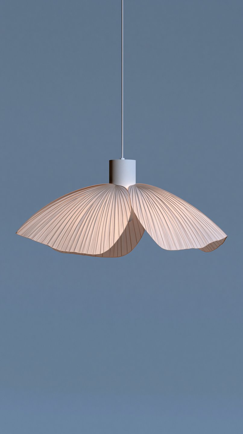 A minimalist pleated pendant lamp with a petal-like shade hangs suspended against a solid blue background.