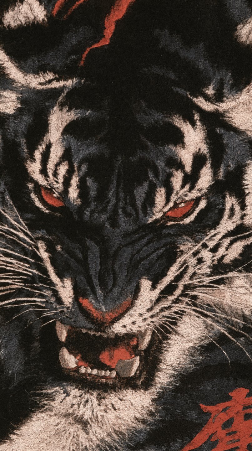Fierce black tiger with glowing red eyes and bared fangs painted in a traditional Japanese ink style.
