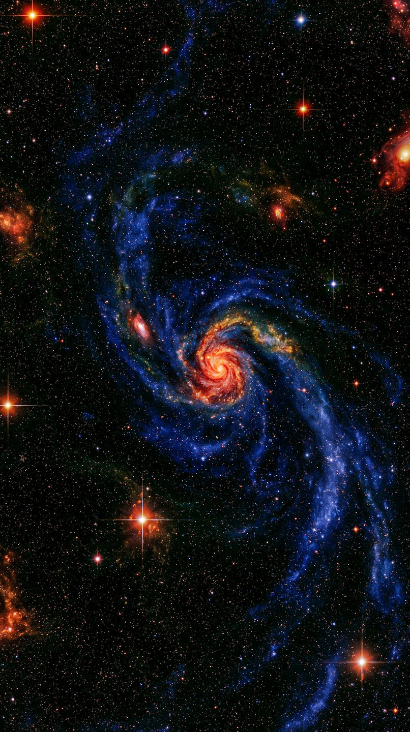 Swirling blue spiral galaxy with a fiery glowing orange core against a dark star-filled space background.
