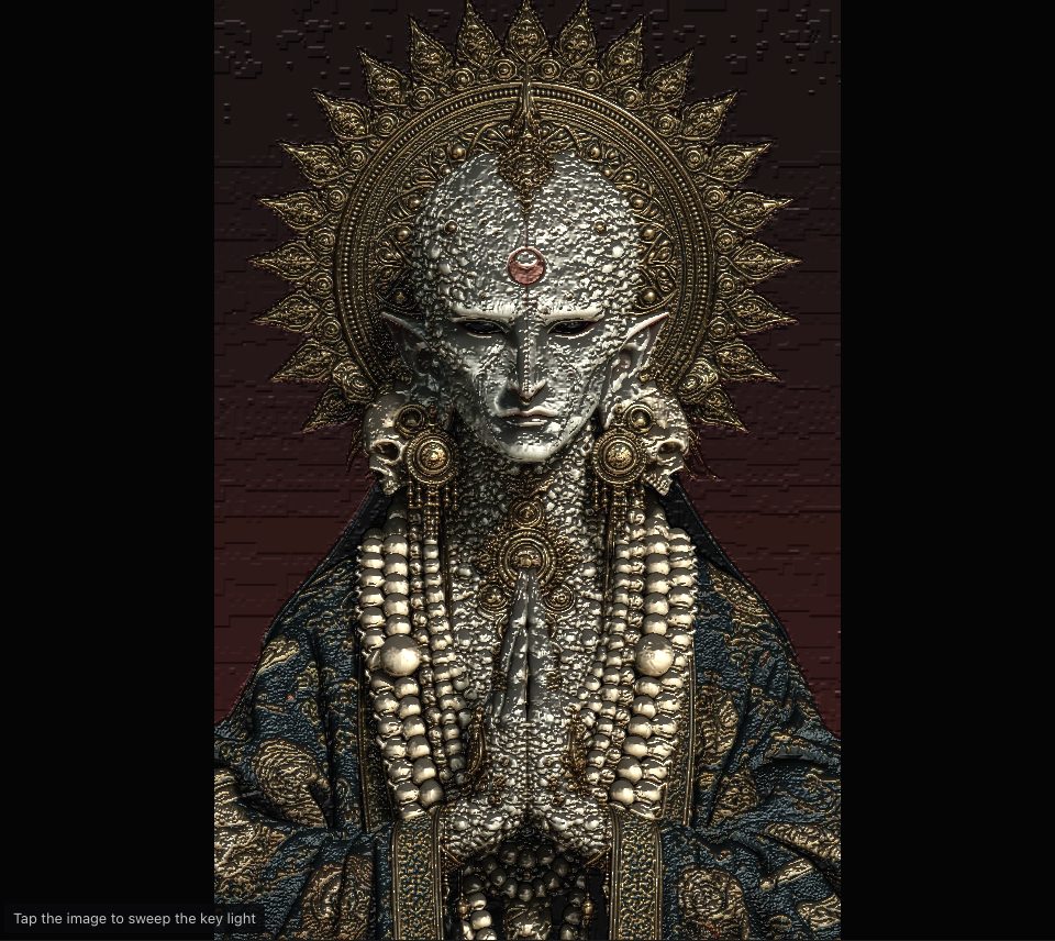 An ornate figure with a pale, jewelled face, a gold sunburst halo and ropes of pearls, lit low from one side so every bead and fold stands out
