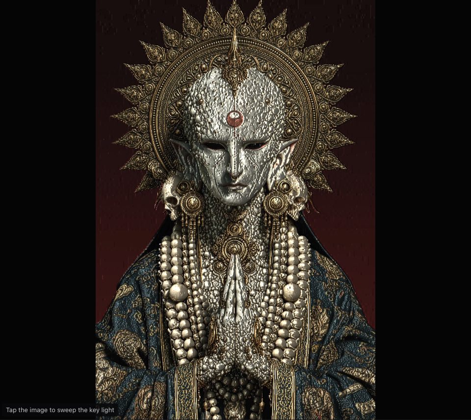 The same jewelled figure lit low from the left, the pearls and the textured face shining on their left sides