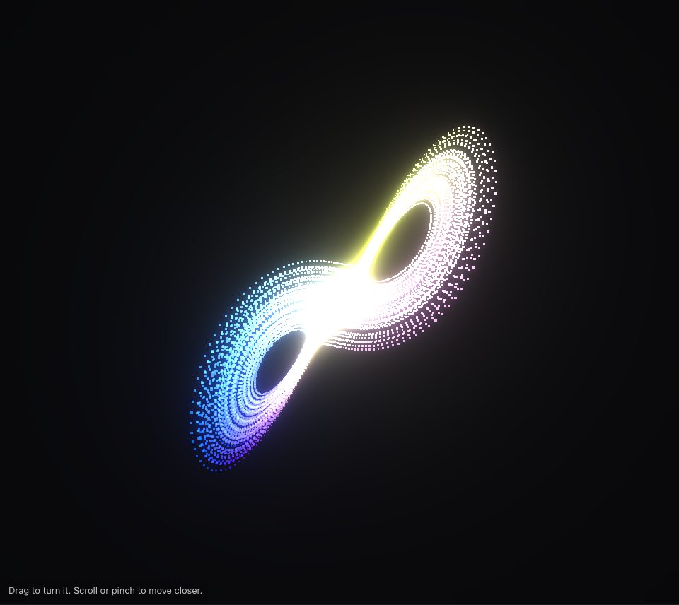 A glowing two-lobed loop of dots, like butterfly wings, blue on one side and white and pink on the other, on a dark ground