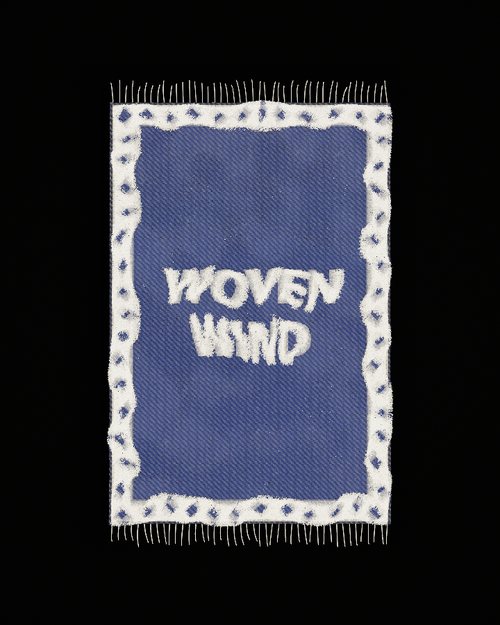 A words motif: WOVEN WIND woven into a blue rug on two lines