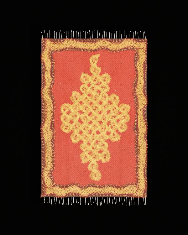 A kolam drawn from the seed pulli: one large diamond of loops