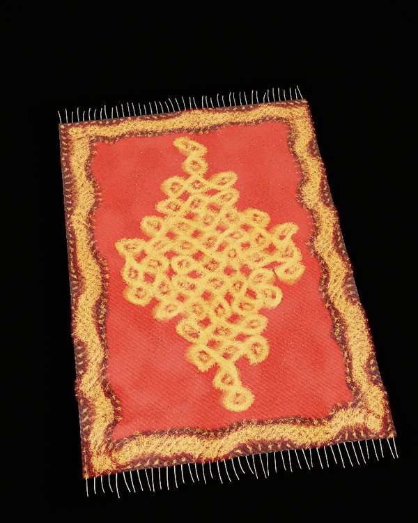 The rug seen at an angle, as a standing person would