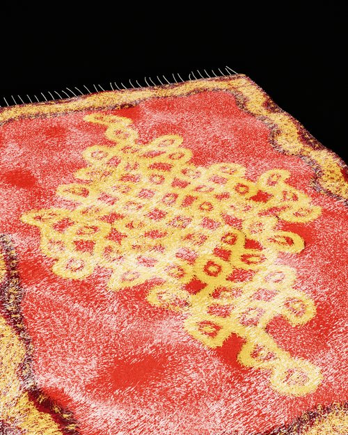 The kolam rug in silk, with bright highlights