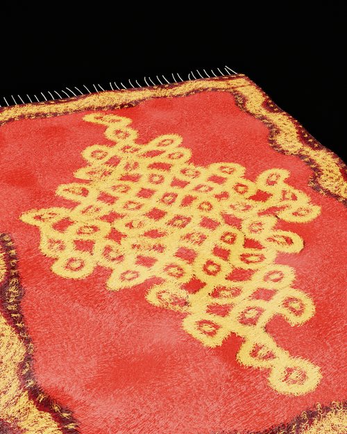 The kolam rug in wool, close up