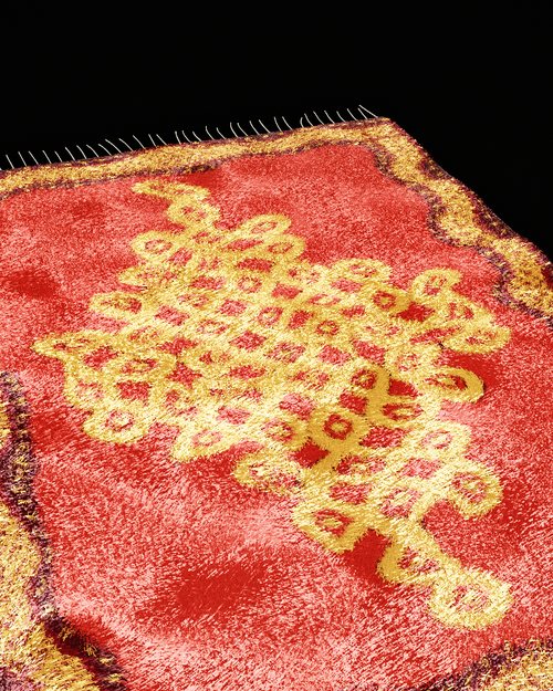 The kolam rug in metallic yarn, with coloured glints